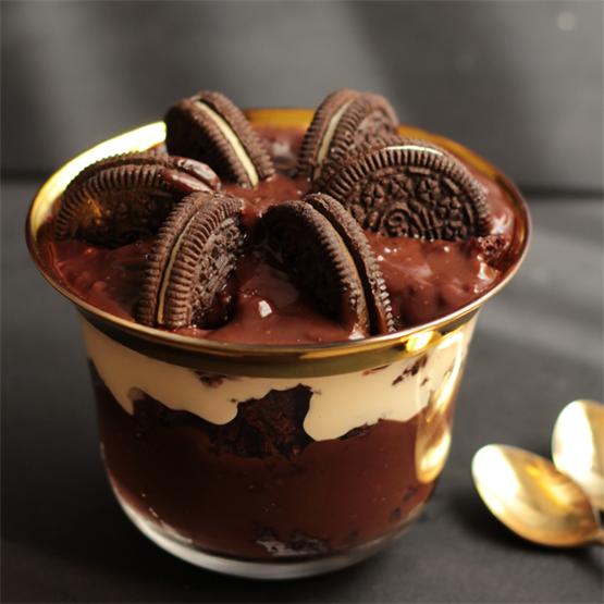 A sinfully delicious trifle with layers of Oreo brownies, choco
