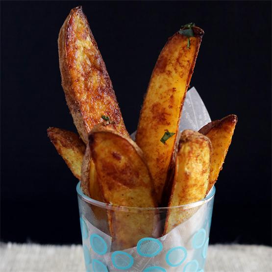 Potato Wedges tossed in aromatic Indian spices and baked.