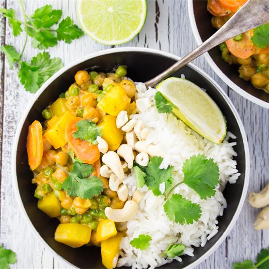 This easy vegan chickpea curry with potatoes, peas, and carrots