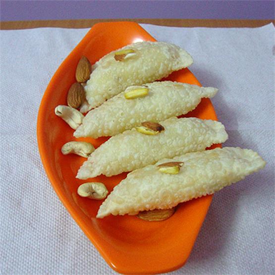 Dry fruit gujiya is very tasty, healthy & easy to make at home.