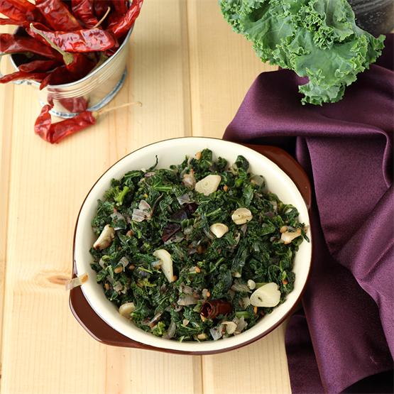 Indian style sauteed Kale with onions, garlic and spices.