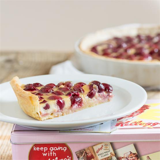Cherry tart with a sugarless flaky crust and a delicate custard