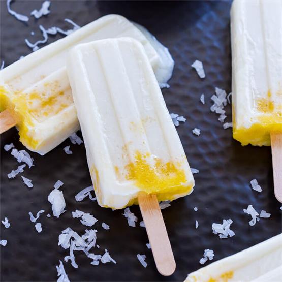 These homemade pina colada popsicles are very tropical and tast