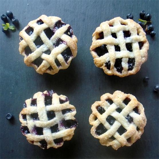 mini bilberry tarts with a lattice crust