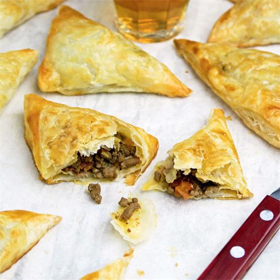 Flaky puff pastries stuffed with spicy minced beef and tomatoes
