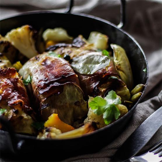 Austrian cabbage roulades with oven-roasted winter veggies.