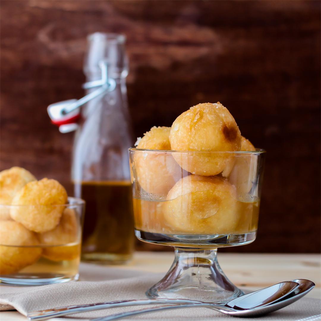 Fried Dough Balls soaked in vanilla cinnamon syrup