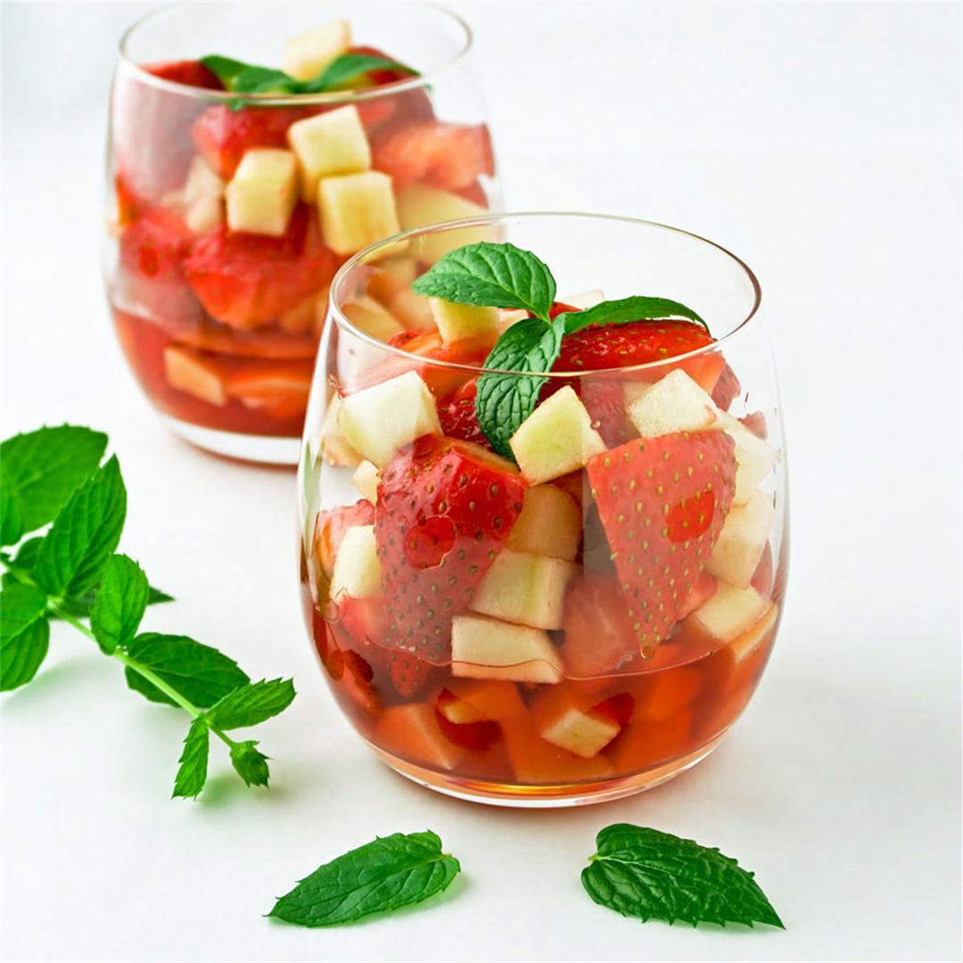 Refreshing strawberry and apple salad with strawberry liqueur