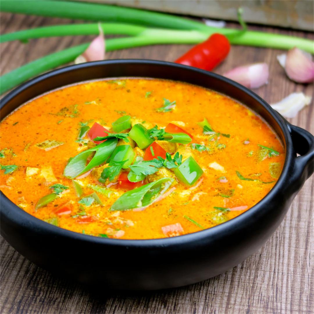 Creamy and spicy Indian curry soup with chicken and vegetables