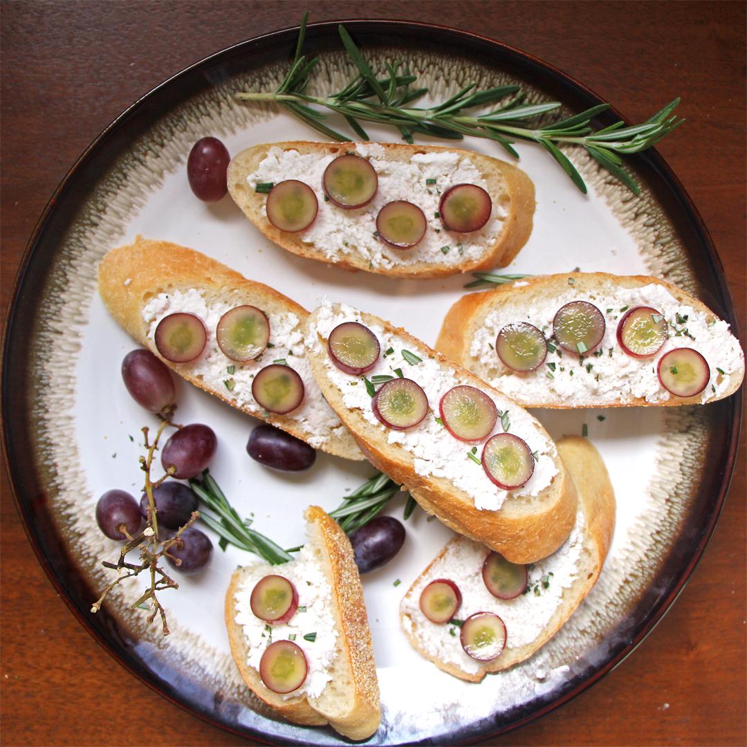 Soft Cheese Crostini with Pickled Grapes and Rosemary