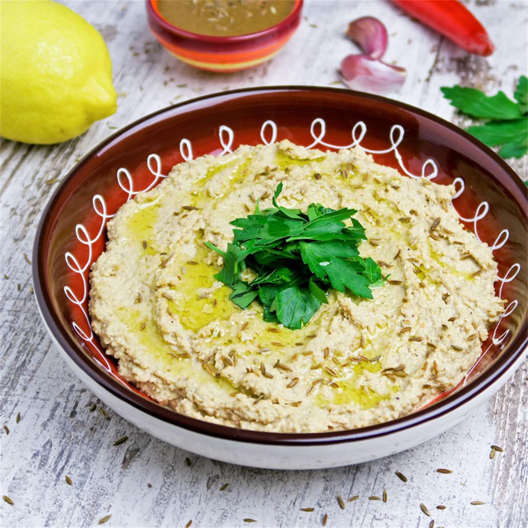 Creamy homemade hummus served with freshly toasted cumin seeds