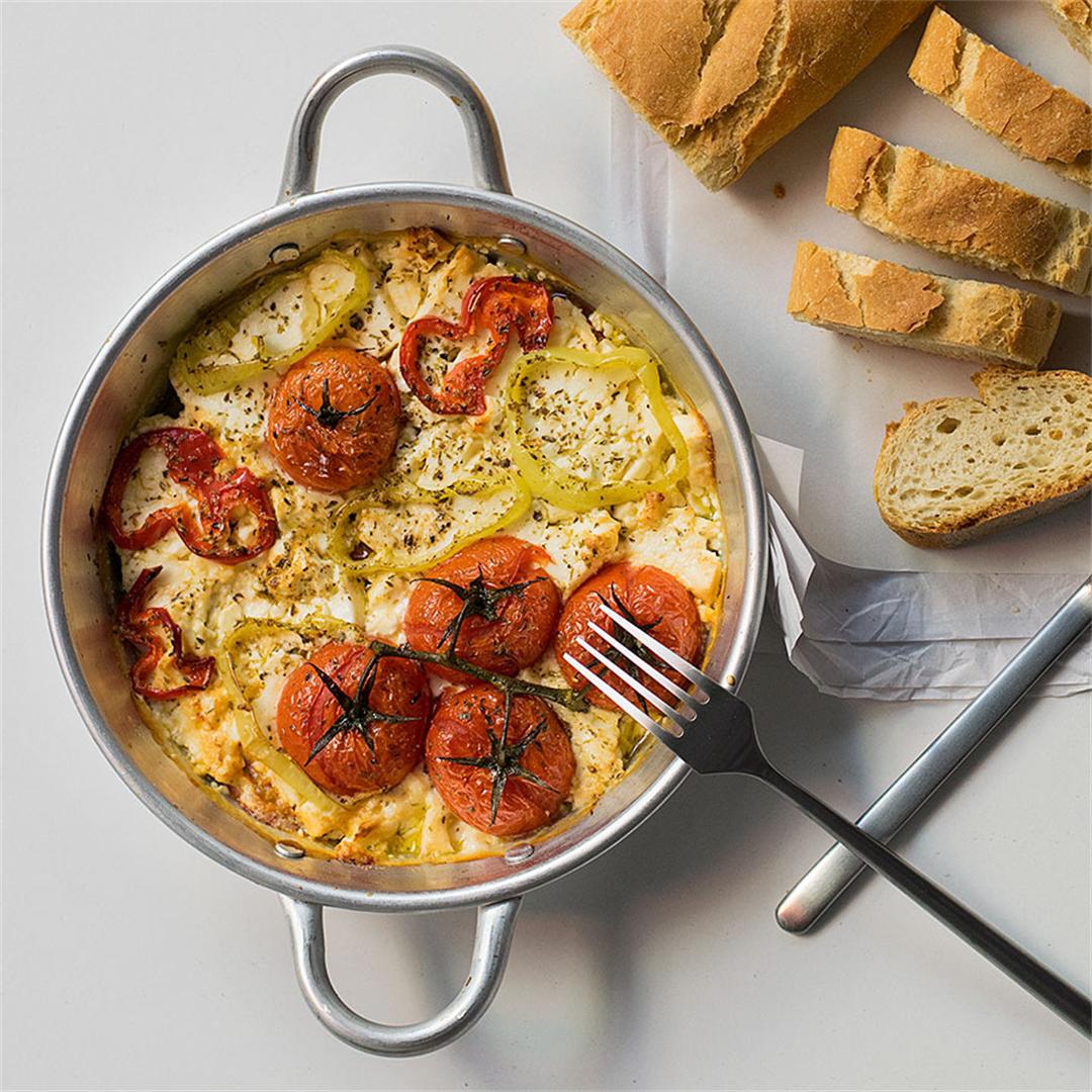 Baked feta cheese with tomatoes and horn peppers