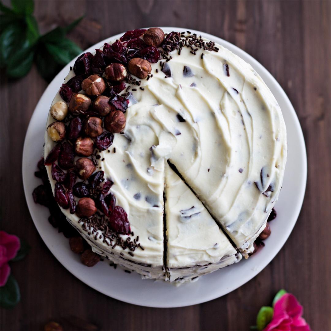Hazelnut Cake with Stracciatella Frosting and Dried Cranberries