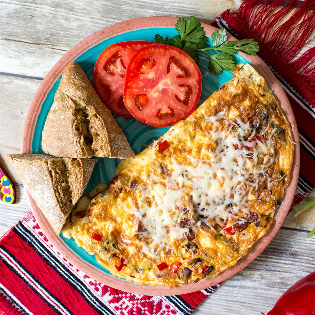 Romanian peasant omelette with sausage, mushrooms and peppers