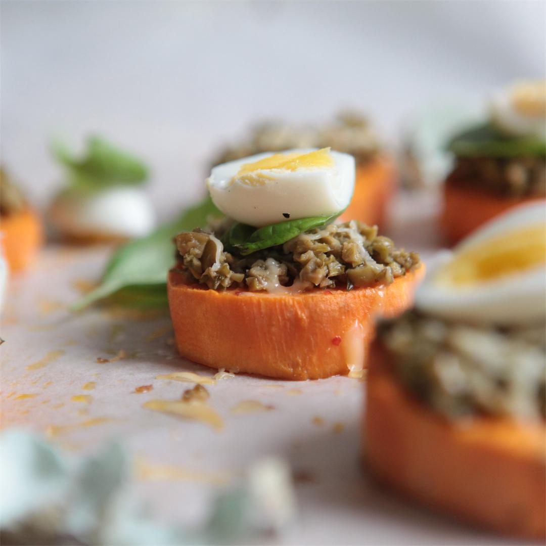 Sweet potato pizza with olive tapenade, quail eggs and cheese