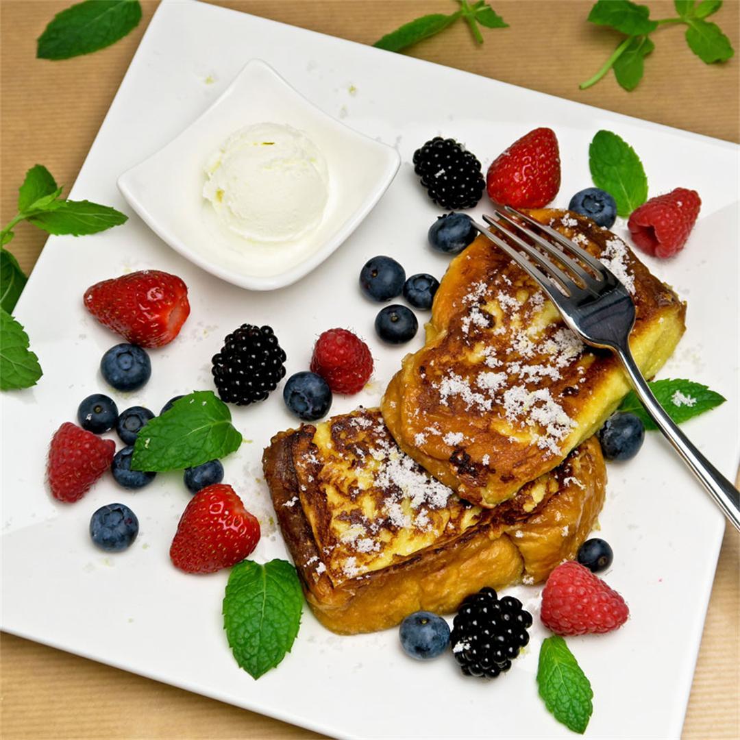 Delicious French toast with berries and vanilla ice cream