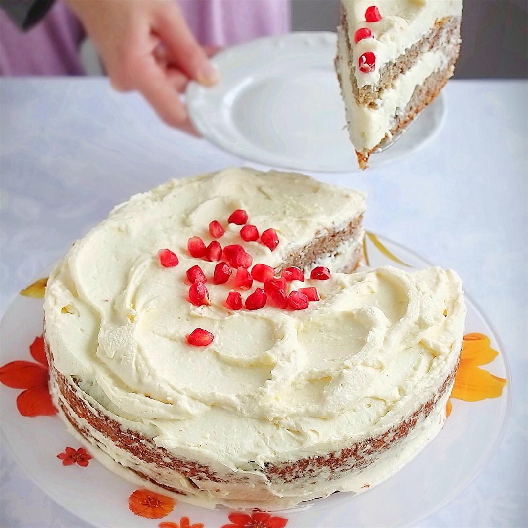 Persimmon cake with pomegranate frosting