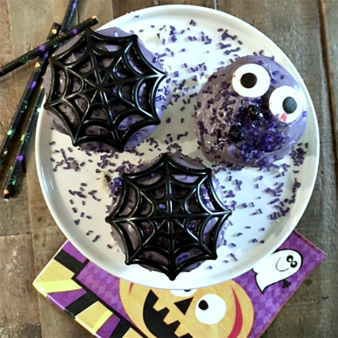 Vanilla Halloween Cupcakes with Fluffy Purple Frosting