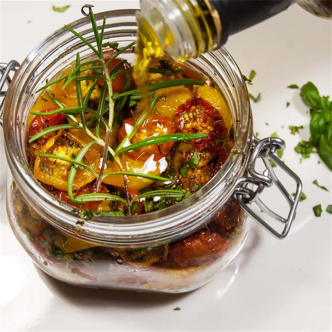 Roasted tomatoes with herbs in olive oil
