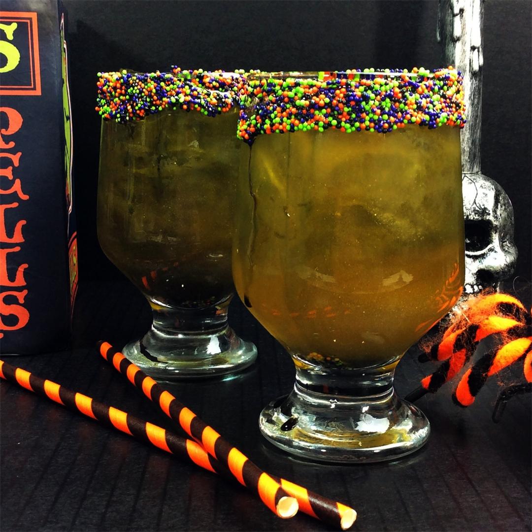 This citrus and sour apple Demon Juice Halloween Cocktail has a
