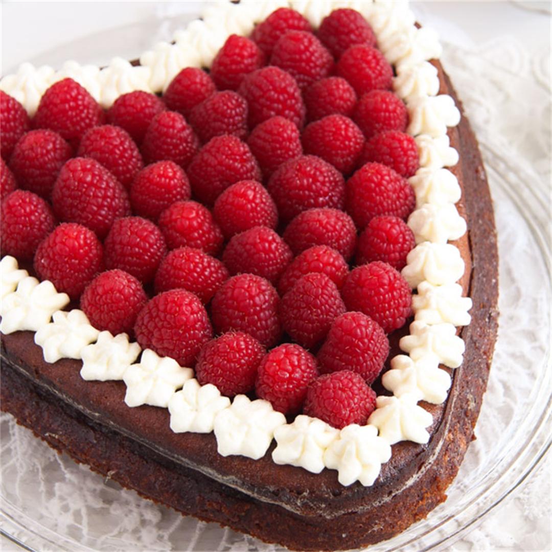 Heart-Shaped Cheesecake with Raspberries and Whipped Cream