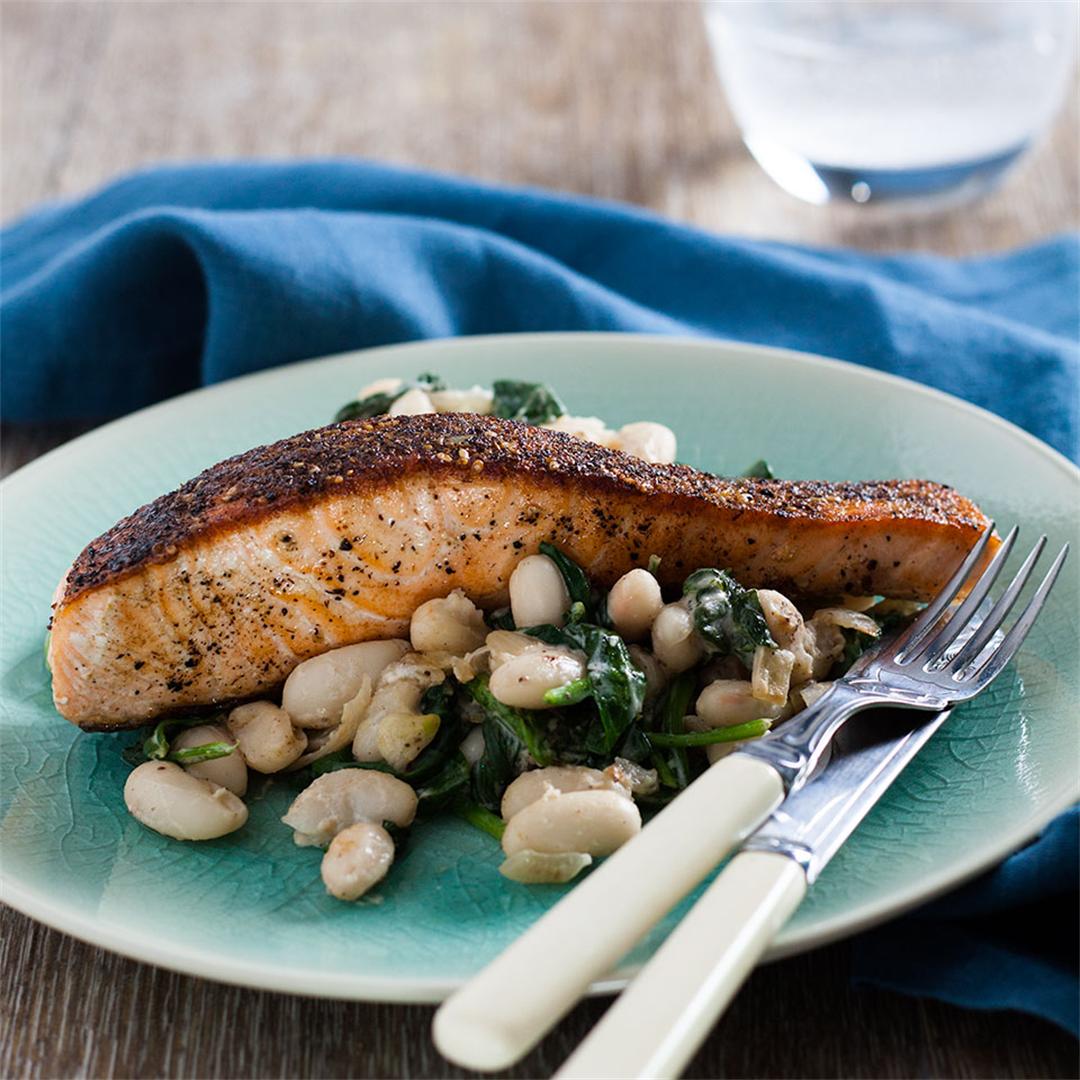 Pan seared salmon with spinach and beans