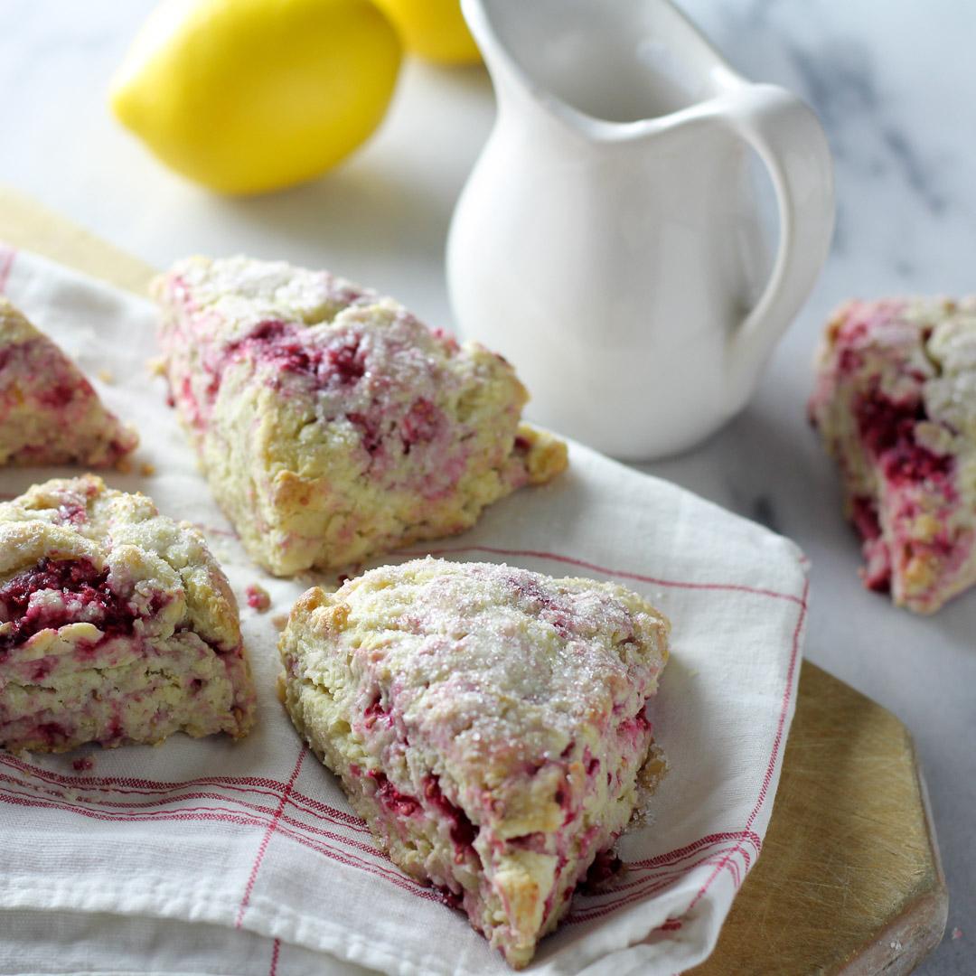 Tender scones with fresh raspberries and lemon zest