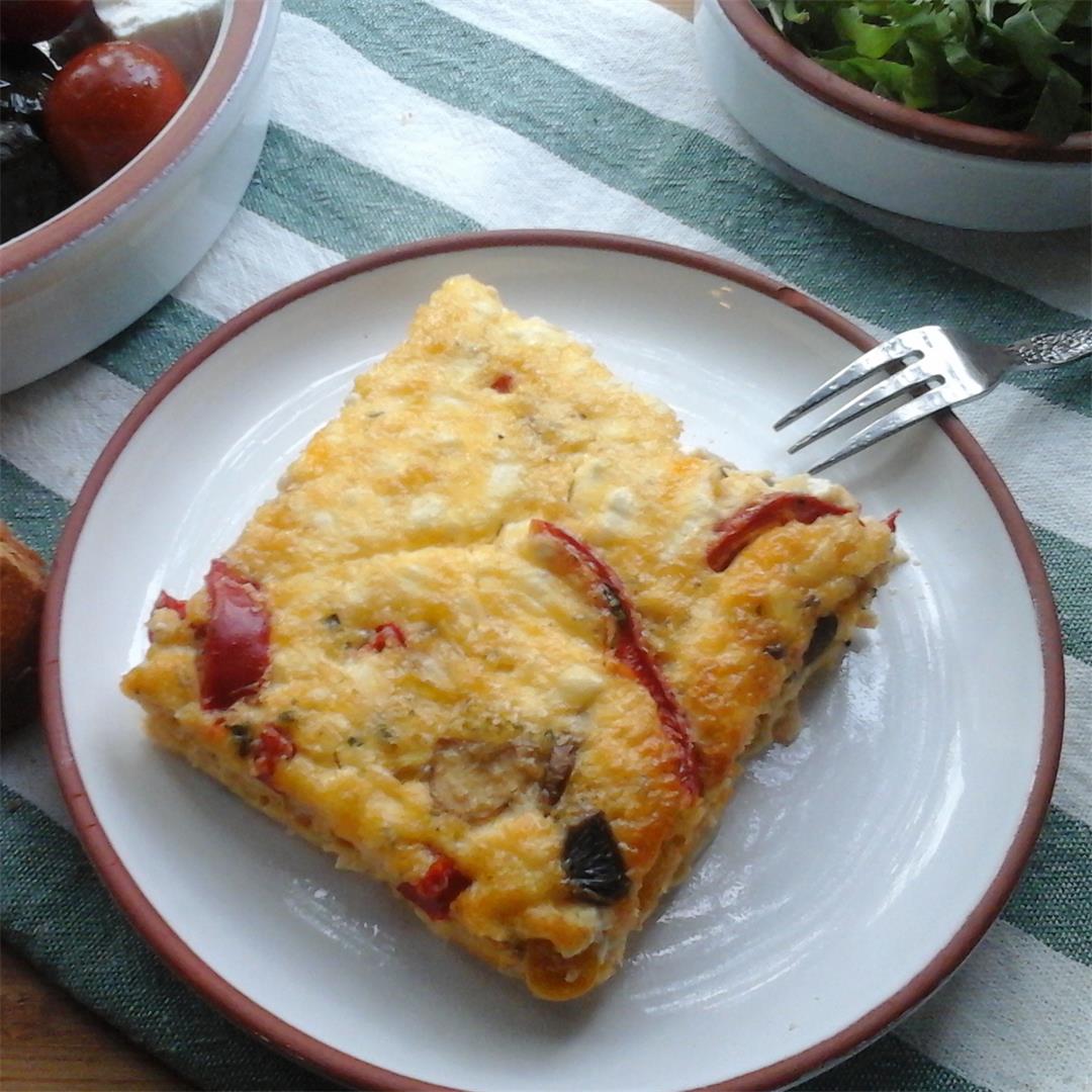 A tasty Omelette filled with Mushrooms, Veggies and Feta Cheese