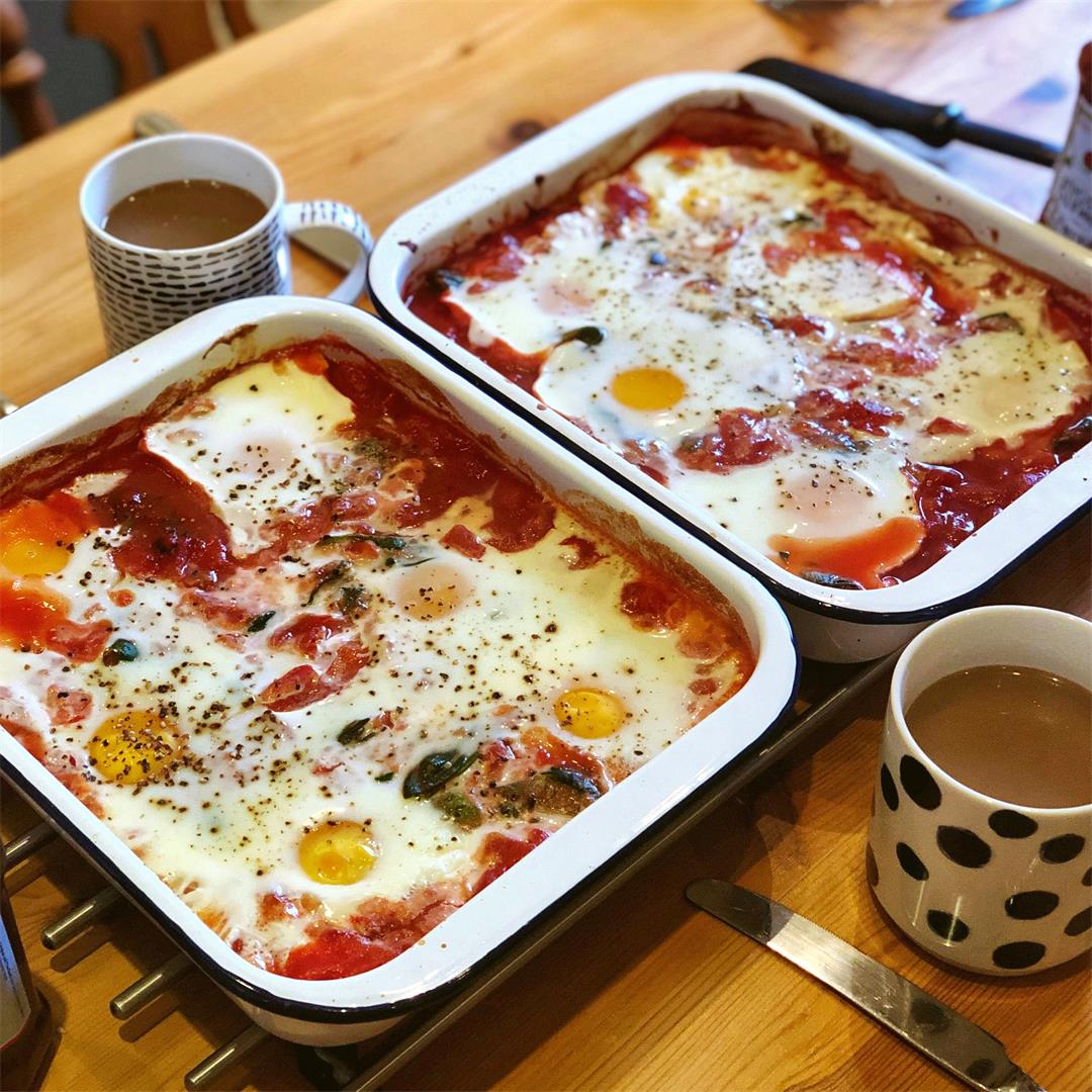 Baked eggs in spiced tomatoes