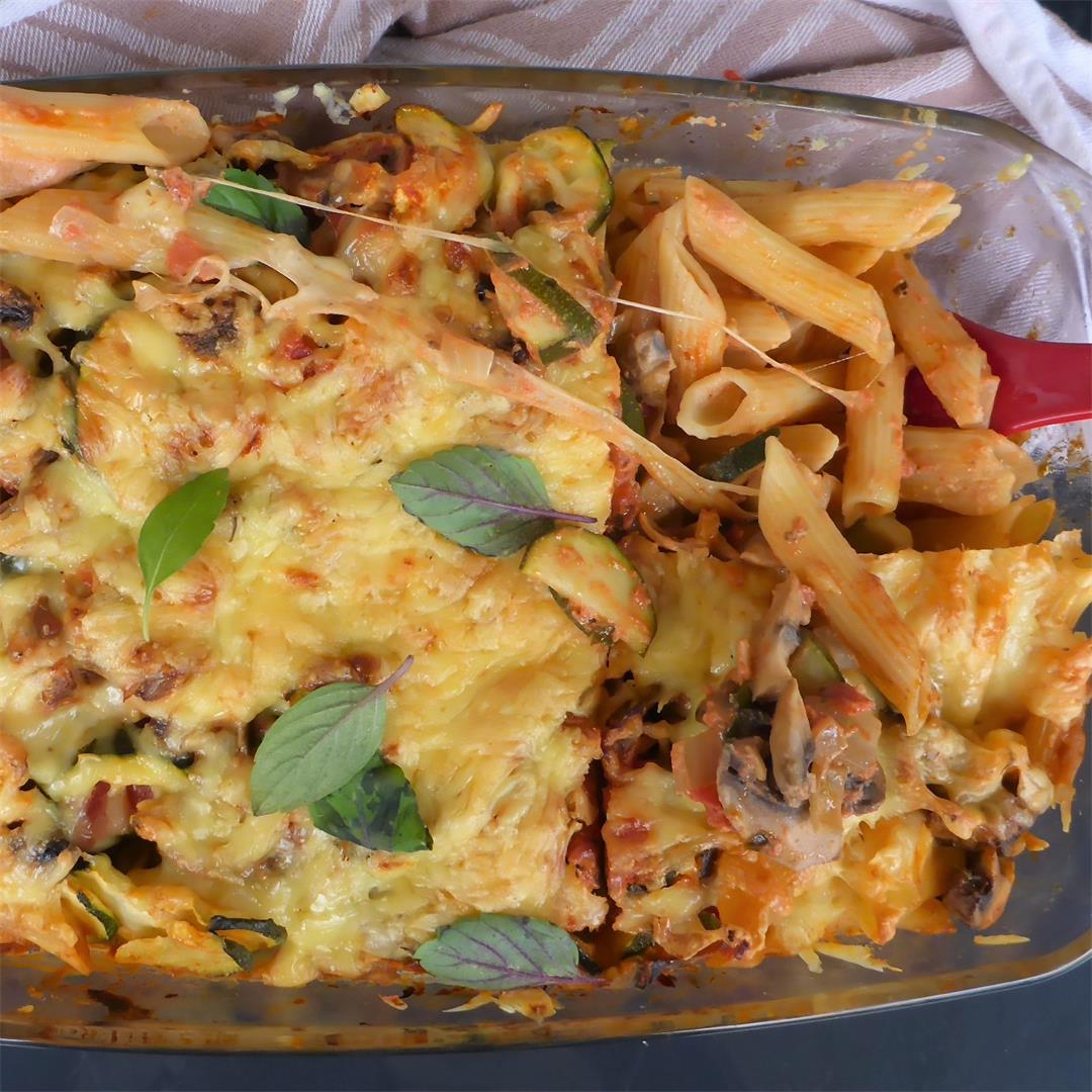 Cheesy baked pasta with zucchini and mushrooms