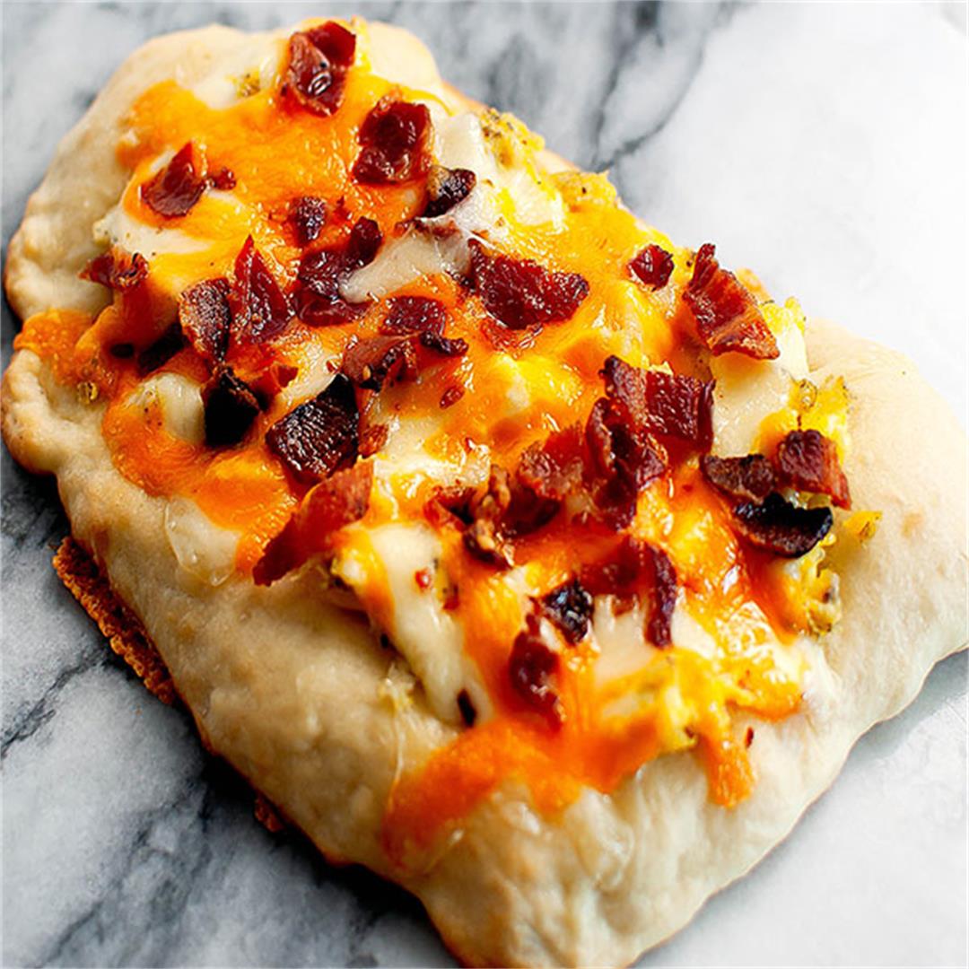 Bacon, Cheese, and Scrambled Egg Breakfast Pizza