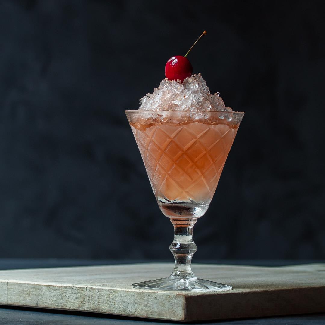 Cherry shrub brandy daisy cocktail