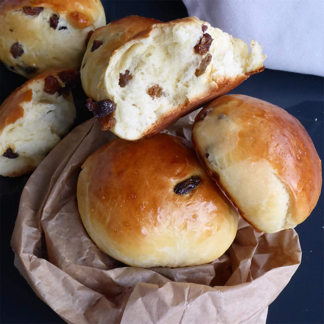 Easy homemade raisin buns made with yeasted dough.