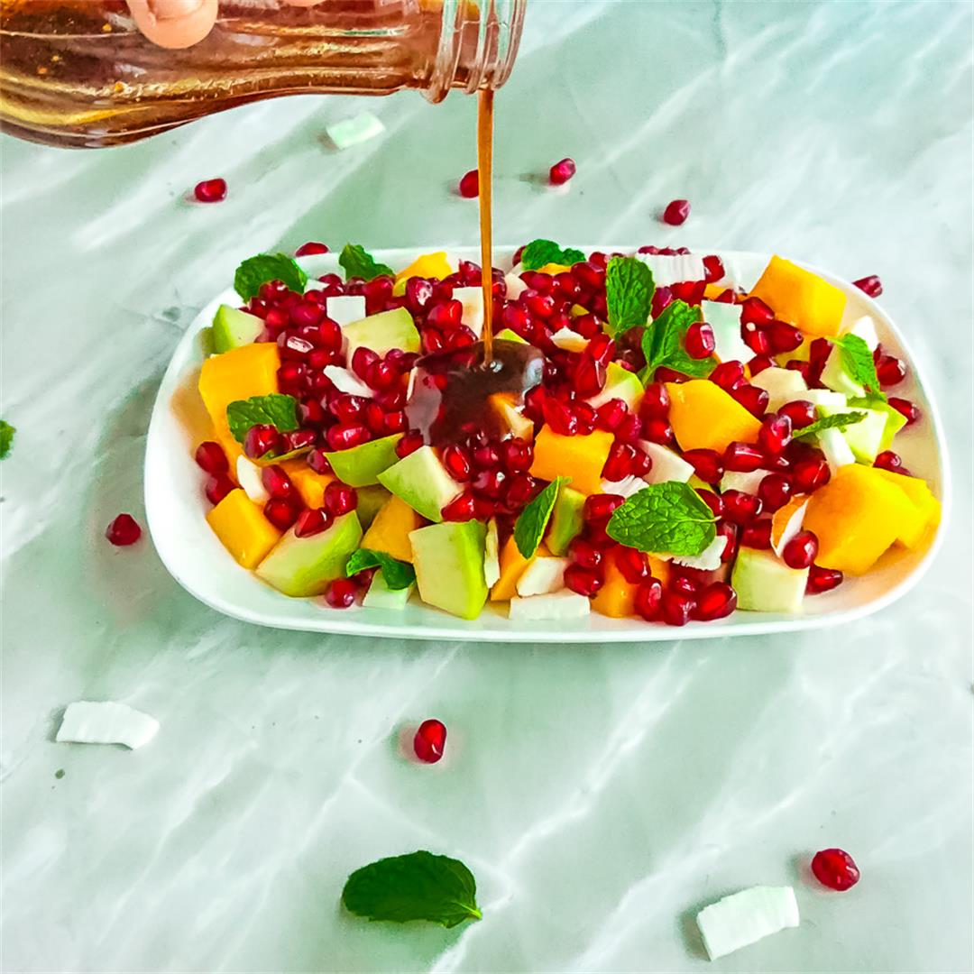 pomegranate salad with mango, coconut and palm sugar dressing