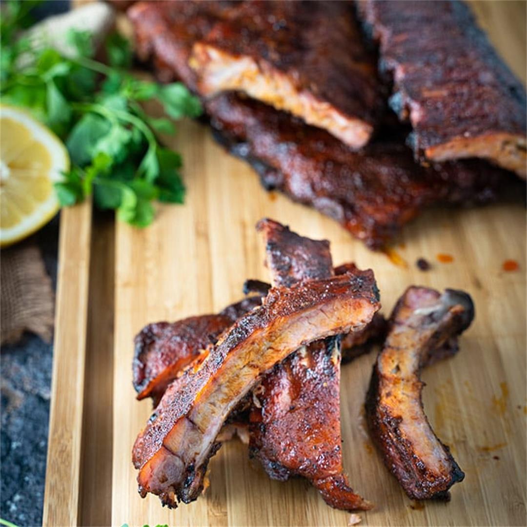 Aaron Franklin-style smoked back ribs on a pellet smoker