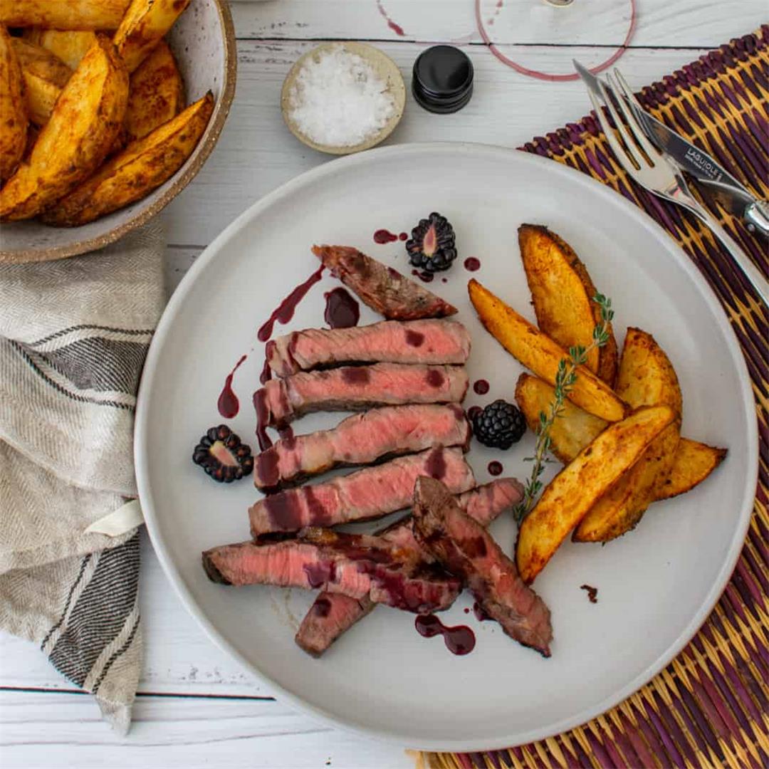 Scotch Fillet, Spicy Wedges and Blackberry Jus