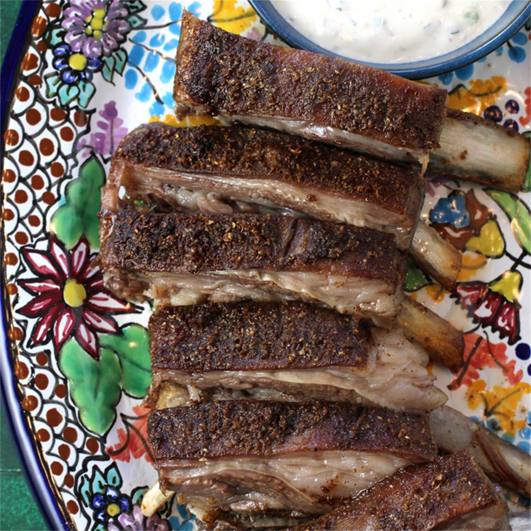 Curtis Stone's spiced lamb ribs with herby labneh sauce