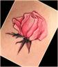 Tiny rose: Placement above breast near underarm.